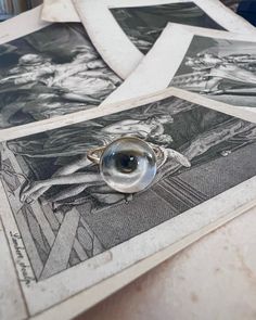 Lover's Eye ring with a round oil painting encased in gold plate over sterling with a quartz crystal cabochon which gives a magical magnifying effect, measuring 1/2"; ring size 6.5. THE HISTORY: Lover's Eyes were a jewelry trend c.1785-1830 of brooches set with tiny watercolor portraits on ivory. Since they were cropped to eyes, they were in many ways more direct and intimate than traditional miniature portraits; but also because they were just eyes, they were often used as daring public testimo Tiny Watercolor, Jewelry Frames, Lovers Eyes, Eye Round, Miniature Portraits, Historical Jewellery, Contemporary Minimalist, Ring Sale, Gold Filled Ring