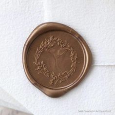 a waxed seal with an image of a horse in a wreath on the side