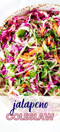 a salad with red cabbage, carrots and lettuce in a white bowl