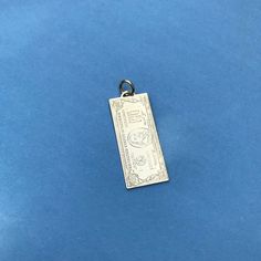 This XL pendant in the shape of a $100 US bill comes in gold plate or rhodium (silver tone) plate - it's got a solid weight to it. Not much else to say! Message me if you have any questions : ) *GOLD is currently made to order and SHIPS March/April 2021! Pendant measurements are 52mm x 21.5mm ------------------------------------------------------------------------------------ I produce jewellery for TV shows and movies and I have a love of zodiac jewellery, especially vintage style pieces. These Zodiac Jewellery, 100 Dollar Bill, Silver Bling, 100 Dollar, Shows And Movies, Zodiac Jewelry, Zodiac Necklaces, Dollar Bill, 22k Gold