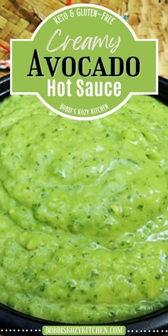 creamy avocado hot sauce in a bowl with tortilla chips on the side