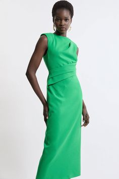 Feel Formal In Our Midi Dress, Which Features A Draped Design And A Fit That Skims The Curves. The Straight Hanging Skirt Features A Leg Split In The Back, And The High Neckline Makes This Piece Ideal For Office Days And Formal Events. Style It With Court Heels Or Strappy Stilettos For A Look Ideal For Anything From Work Days To Dinner Dates. Structured Crepe Asymmetric Drape Waist Tailored Midi Dress High Quality Crepe Fabric Flattering, Fitted Silhouette Draped Waist Design High Neckline Zip B Bride Jumpsuit, Petite Wedding Guest Dresses, Plus Size Workwear, Summer Bridesmaid Dresses, Dinner Dates, Leg Split, Court Heels, Tall Dresses, Italy Outfits