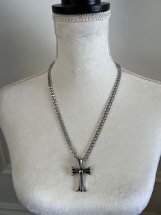 "NECKLACE FEATURES:  -CHAIN : 2DC STAINLESS STEEL 1.6MM  -LARGE CROSS MEASUREMENTS - 50 X 80MM  -LARGE CROSS HIGH POLISHED STAINLESS STEEL   I AM WEARING 22\" LENGTH IN THE IMAGES - DROP DOWN LENGTH OPTION AVAILABLE QUANTITY - 1 NECKLACE 1 CROSS PENDANT  NECKLACE DOES NOT HAVE INCH EXTENSION, PLEASE MEASURE ACCORDINGLY  WATER PROOF | TARNISH RESISTANT THERE IS A NO RETURN, NO EXCHANGE POLICY FOR THIS ITEM | FINAL SALE JEWELRY CARE INSTRUCTIONS Fashion jewelry tarnishes when exposed to moisture, Metal Cross Pendant Necklace, Silver Cross Pendant Chain Jewelry, Adjustable Cross Chain Jewelry, Silver Cross Pendant Necklace With Chain, Silver Cross Necklace With Chain Pendant, Adjustable Silver Cross Pendant Jewelry, Silver Pendant Cross Necklace With Chain, Metal Chain Cross Necklace, Silver Chain Cross Jewelry