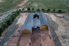 an aerial view of a building in the middle of nowhere