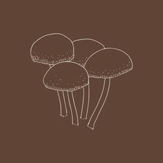 three mushrooms sitting on top of each other in the middle of a brown background,