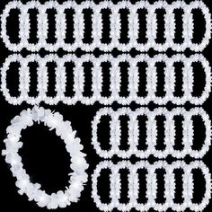 a set of white crochet trims and a wreath on a black background