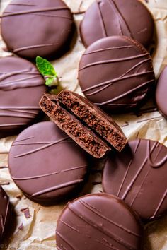 chocolate covered cookies with one cut in half