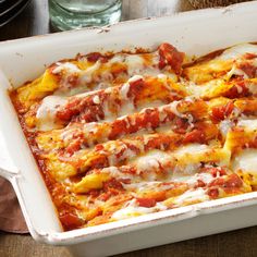 a casserole dish filled with meat and cheese