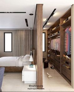 a bedroom with a bed, closet and dressing area