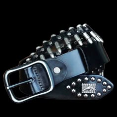 Rock 'n reload When you're shooting for that outlaw bandit look, it's time to rock this genuine leather belt that looks like a bandolier loaded with bullets.It comes in four colors and three sizes, and is also studded with skull and crossbones, and a design featuring a gun in front of a row of bullets.The buckle and bullets are metal alloy, and the belt is 3.8 cm (1.18 in.) wide.Rock it and you'll never run out of ammo, or have to ask yourself "did I fire six shots or only five?" Plays well with Outlaw Outfit, Digital Lookbook, Black Metal Fashion, Belts Aesthetic, Rock Accessories, Bell Chimes, Bullet Belt, Jewelry Kpop, Belt Collection