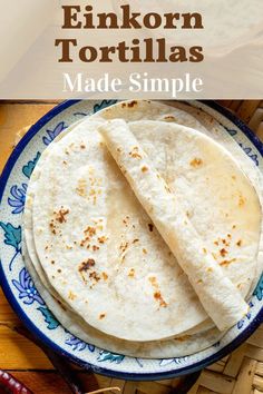 two tortillas on a blue and white plate with text overlay that reads how to make an enkron tortillas made simple