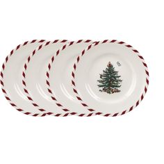 three christmas plates with red and white stripes on the rims, each holding a small tree