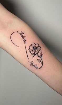 a woman's arm with a tattoo on it that says, i love you