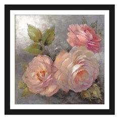 two pink roses on a gray background in a living room setting with pillows and throw pillows