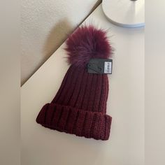 New Burgundy Dark Red Knit Hat With Fur New With Tags Material: Acrylic Red Knit Winter Hat, Trendy Fitted Warm Hats, Trendy Fitted Crochet Hat For Winter, Trendy Fitted Knitted Hats, Red Knit Casual Beanie, Cozy Red Beanie For Fall, Cold Weather Ribbed Hats, Trendy Knit Hat One Size, Cozy Red Hat For Cold Weather