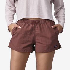 The Barely Baggies™ Shorts have a lower rise and a shorter inseam than our classic Baggies, with side slits at the hem for comfort. They're built of 100% recycled nylon faille with a durable water repellent (DWR) finish made without perfluorinated chemicals (PFCs/PFAS). Inseam length is 2½, and there's a P-6 logo at the left hem. | Patagonia Women's Barely Baggies™ Shorts - 2½" Inseam in Dulse Mauve, Large - Casual Shorts - Recycled Nylon/Recycled Polyester Patagonia Nylon Casual Shorts, Patagonia Casual Nylon Shorts, Travel Shorts With Elastic Waistband, Patagonia Sporty Relaxed Fit Bottoms, Sporty Patagonia Bottoms, Patagonia Sporty Shorts, Patagonia Casual Cotton Bottoms, Casual Patagonia Shorts With Pockets, Patagonia Casual Shorts With Pockets