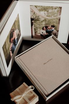 an open photo book with two pictures on it and a couple's wedding album