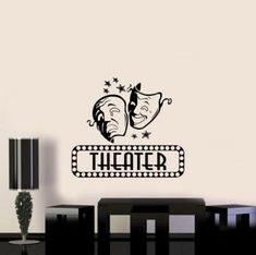 theater wall decal with two masks and the word theater on it's side