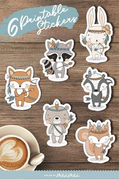 six stickers with different animals on them next to a cup of cappuccino