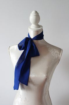 Chiffon skinny neck tie. This multifunctional day to night piece is a must have for every closet. You can wear it in many ways. Wear it loosely for layered look or knotted as a chic choker. Must have for every fashionista! Try it out as a hair wrap! Size Length 155cm | 61 in Width 5 cm | 2 in Available also in different colors. Handmade item. Wonderful gift for women or female friends. Feel free to contact me if you have any questions ;) Formal Scarf Neckwear, Chic Blue Scarves For Gifts, Chic Blue Silk Scarf As Gift, Elegant Blue Shawl For Summer, Elegant Summer Blue Shawl, Elegant Blue Summer Shawl, Elegant Blue Scarves For Wedding, Elegant Blue Scarf For Wedding, Classic Scarf Neckwear As Gift