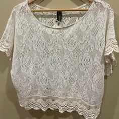 Nwt Made In Usa Cotton/Poly Casual Crochet Lace Top With Lace Trim, White Lace Patchwork Crop Top For Spring, Chic Open Knit Lace Tops, Chic Lace Tops With Crochet Trim, White Open Knit Lace Top, White Lace Top With Open Knit Detail, White Crochet Top With Lace Work, Cream Open Knit Lace Tops, Cream Lace Top With Crochet Details