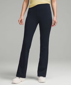 The ease of a pull-on pant with the look of a trouser. These office-ready pants feature an easy-to-style silhouette with a discreet, smoothing waistband that's stretchy but comfortably snug. Designed for Casual. Slim fit skims your body:Subtle flared leg:32" inseam, intended to sit below ankle for heights of 5'5"-5'8":Opt for your usual size. Expect them to feel snug as you pull them over your hips but comfortable once on. Smooth-Fit Waistband technology uses bonded construction to create a comf Black Lululemon Leggings, Lululemon Black Leggings, Black Wide Leg Trousers, School Clothes, High Rise Pants, Straight Leg Trousers, Lululemon Women, Pull On Pants, Cropped Leggings