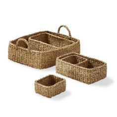 three wicker baskets with handles and handles on the bottom, one holding two smaller baskets