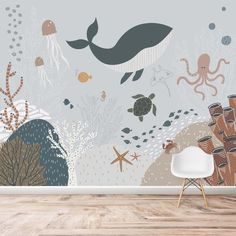 an underwater scene with sea animals and other marine life wallpaper mural in a children's room