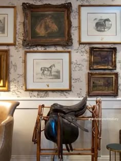 there are many framed pictures on the wall with horse tacks and saddle in it