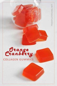 orange gummy bears in a glass bowl on a white surface with the words orange cranberry collagen gummies