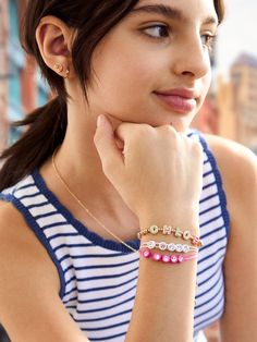 Brighten up your little one’s wrist stack with the Bubblegum Baby Kids’ Bracelet Set. This pack includes three adorable pull tie bracelets in pink, blue and white. Each one is decorated with cute white gemstones so even your mini can rock some sparkle. Please note: intended for children 3+. Tie Bracelets, Ice Cream Kids, Ballerina Kids, Bracelets For Kids, White Gemstones, Wrist Stack, Kids Bracelet, Holiday Headbands, Unicorn Earrings