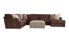 a brown sectional couch with pillows on the back and footstools, sitting in front of a white background