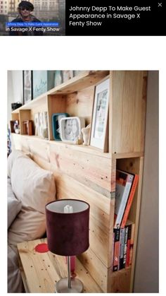 a bed room with a book shelf and a lamp