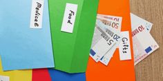 several different colored folders with name tags on them