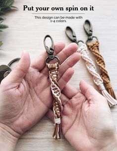 a person holding a keychain that has been made with macrame beads