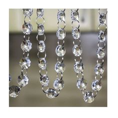 three crystal beads hanging from the ceiling