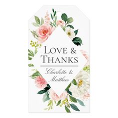 a wedding gift tag with flowers and greenery on the front, says love & thanks