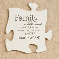 a puzzle piece with the words family is like music, some high notes, some low notes, but always a beautiful song