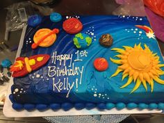 a birthday cake with the solar system on it