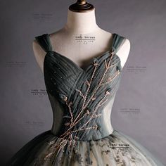 a dress on a mannequin with beading