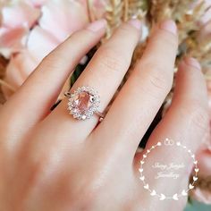 Morganite Halo engagement ring padparadscha sapphire colour | Etsy Pink Morganite Halo Jewelry, Oval Morganite Wedding Ring With Brilliant Cut, Pink Morganite Jewelry With Halo Design, Oval Morganite Diamond Ring For Wedding, Oval Pink Morganite Diamond Ring, Pink Cushion Cut Diamond Ring For Wedding, Pink Emerald-cut Sapphire Wedding Ring, Wedding Pink Sapphire Ring With Halo Design, Pink Diamond Topaz Ring For Wedding