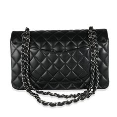 A timeless classic that never goes out of style, the flap bag from Chanel dates back to 1955 and has seen a number of updates. The design was revolutionary for its time, giving its wearers the freedom to carry their everyday must-haves without the cumbersome nature of a larger bag. The bag features the classic leather-entwined chain-link shoulder strap for a distinctive aesthetic. Item #: 139222 MSRP: 10,200 Size: Medium Circa: 2021-2023 Condition: Very Good Includes: Box;Dustbag;Receipt;Care Booklet;Retail Tag Exterior Color: Black Strap Length: 9-17 Made in: France Dimensions: 10 x 6 x 2.5 Exterior Material: Leather Balenciaga Backpack, Hermes Bags, Black Quilt, Chanel Black, The Freedom, Large Bag, Fendi Bags, Classic Leather, Flap Bag