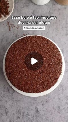 a bowl filled with brown rice sitting on top of a table