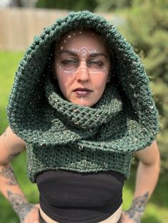 Elevate your winter wardrobe with this stunning handmade chunky crochet hooded cowl. Crafted with love and care, this versatile piece combines the warmth of a scarf with the cozy comfort of a hood, making it a perfect accessory for cold weather. Features: *Material: Soft, high-quality yarn in a rich forest green hue, speckled with subtle flecks for added texture and charm. *Design: The oversized hood provides ample coverage, ensuring you stay warm while adding a touch of whimsy to your outfit. *Versatility: Can be worn as a hooded cowl or a full-face covering for extra warmth and style. Ideal for layering over any outfit. *Handmade: Each piece is lovingly crocheted by hand, ensuring unique quality and attention to detail. Care Instructions: *Hand wash in cold water *Lay flat to dry *Do not Crochet Hooded Cowl, Hooded Cowl, Chunky Crochet, Face Coverings, Comforters Cozy, Handmade Accessories, Winter Wardrobe, Forest Green, Stay Warm