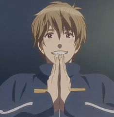 an anime character is holding his hands up to his mouth and looking at the camera