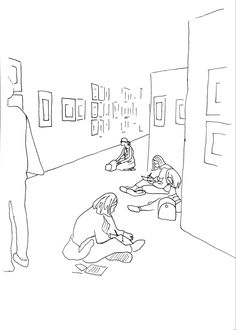 three people sitting on the floor in a room