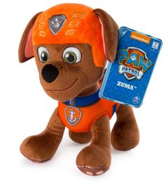 the paw patrol stuffed animal is wearing an orange shirt and carrying a blue tag on it's chest