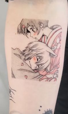 a woman's thigh with two anime characters on it, one is hugging the other