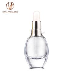 Item: XYD021, 
15-30-50ml dropper bottles, have stock in clear bottle,gold/silver dropper closures+white teat, 
artwork as screen printing,hot stampling ...... etc available, 18 years experiences manufacturer for beauty skincare personal care cosmetic glass packaging