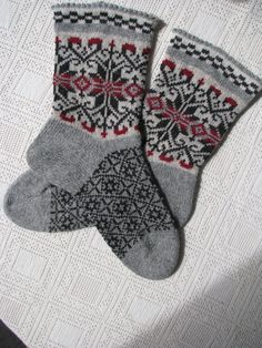 Very nice and warm wool men's socks with Norwegian arnamentom. On a fishing trip in the mountains, in the woods, on the farm or just at home your feet will always be warm and cozy. Socks made of wonderful ecological wool Estonia. Send me your size, desired width or colors, and I'm knitting socks for you. Galina Nordic Knitted Winter Socks, Winter Nordic Knitted Socks, Comfortable Winter Socks With Fair Isle Pattern, Cozy Winter Socks With Fair Isle Pattern, Scandinavian Style Winter Socks With Fair Isle Pattern, Comfortable Fair Isle Pattern Winter Socks, Cozy Outdoor Socks For Winter, Cozy Winter Socks For Outdoor, Cozy Winter Outdoor Socks